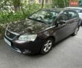 Коричневий Джилі Емгранд, об'ємом двигуна 1.79 л та пробігом 32 тис. км за 5500 $, фото 1 на Automoto.ua