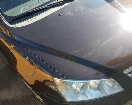 Коричневый Джили Эмгранд, объемом двигателя 2 л и пробегом 145 тыс. км за 4300 $, фото 1 на Automoto.ua