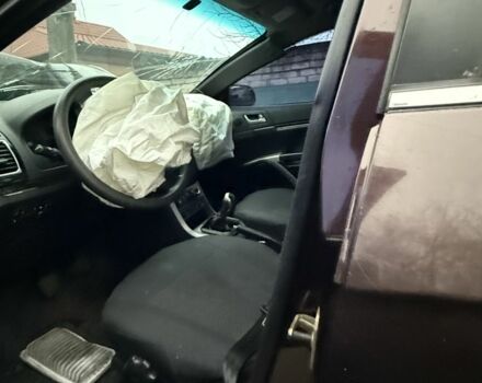 Коричневый Джили Эмгранд, объемом двигателя 1.8 л и пробегом 180 тыс. км за 1050 $, фото 3 на Automoto.ua