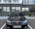 Коричневий Джилі Емгранд, об'ємом двигуна 1.8 л та пробігом 137 тис. км за 3900 $, фото 1 на Automoto.ua