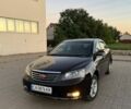 Коричневый Джили Эмгранд, объемом двигателя 1.5 л и пробегом 180 тыс. км за 3200 $, фото 1 на Automoto.ua