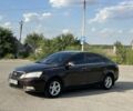 Коричневый Джили Эмгранд, объемом двигателя 1.5 л и пробегом 200 тыс. км за 3450 $, фото 1 на Automoto.ua