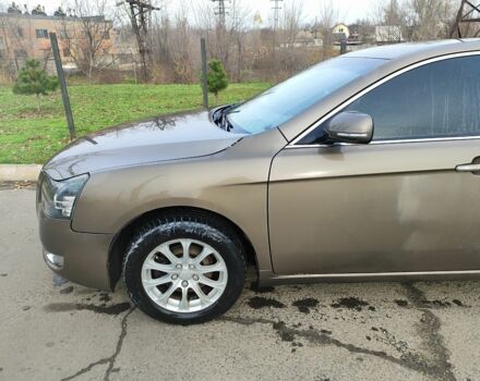 Коричневий Джилі Емгранд, об'ємом двигуна 2 л та пробігом 170 тис. км за 3800 $, фото 3 на Automoto.ua