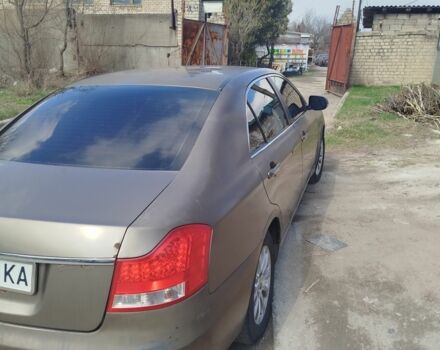 Коричневий Джилі Емгранд, об'ємом двигуна 2 л та пробігом 150 тис. км за 4200 $, фото 1 на Automoto.ua