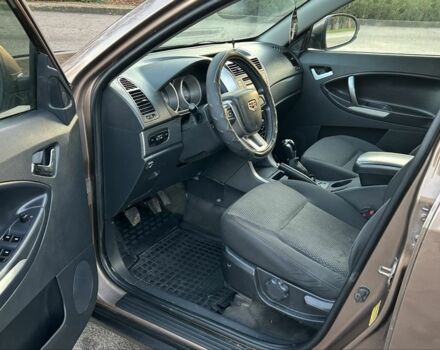 Коричневий Джилі Емгранд, об'ємом двигуна 2 л та пробігом 268 тис. км за 4799 $, фото 4 на Automoto.ua