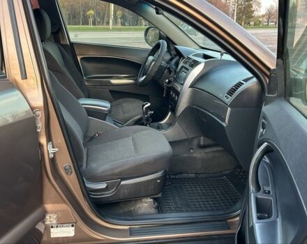 Коричневий Джилі Емгранд, об'ємом двигуна 2 л та пробігом 268 тис. км за 4799 $, фото 10 на Automoto.ua