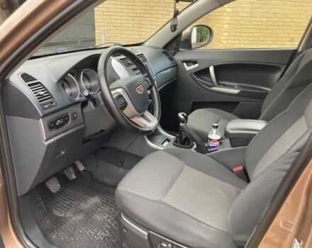 Коричневий Джилі Емгранд, об'ємом двигуна 2 л та пробігом 122 тис. км за 6000 $, фото 6 на Automoto.ua