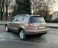 Коричневий Джилі Емгранд, об'ємом двигуна 2 л та пробігом 268 тис. км за 4799 $, фото 2 на Automoto.ua