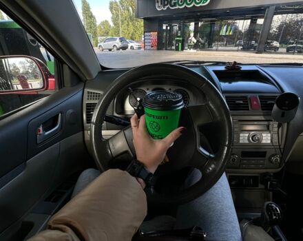 Красный Джили Эмгранд, объемом двигателя 1.8 л и пробегом 200 тыс. км за 3550 $, фото 5 на Automoto.ua