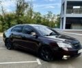 Красный Джили Эмгранд, объемом двигателя 1.8 л и пробегом 232 тыс. км за 5500 $, фото 1 на Automoto.ua