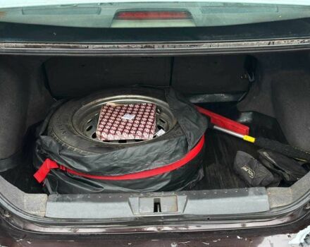 Красный Джили Эмгранд, объемом двигателя 1.8 л и пробегом 122 тыс. км за 4450 $, фото 9 на Automoto.ua