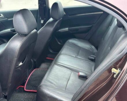 Красный Джили Эмгранд, объемом двигателя 1.8 л и пробегом 122 тыс. км за 4450 $, фото 2 на Automoto.ua