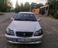 Серый Джили Эмгранд, объемом двигателя 1.5 л и пробегом 100 тыс. км за 1211 $, фото 1 на Automoto.ua