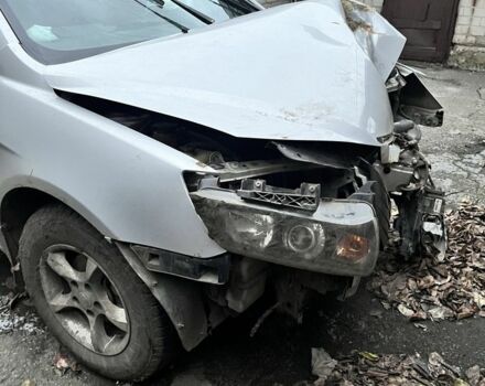 Серый Джили Эмгранд, объемом двигателя 1.8 л и пробегом 110 тыс. км за 1700 $, фото 1 на Automoto.ua