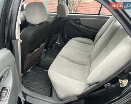 Черный Джили МК, объемом двигателя 1.59 л и пробегом 125 тыс. км за 2350 $, фото 1 на Automoto.ua