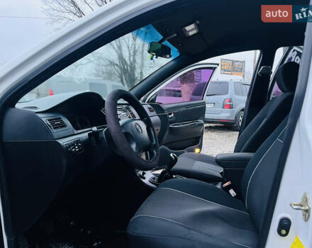 Білий Джилі СЛ, об'ємом двигуна 1.79 л та пробігом 184 тис. км за 3400 $, фото 8 на Automoto.ua