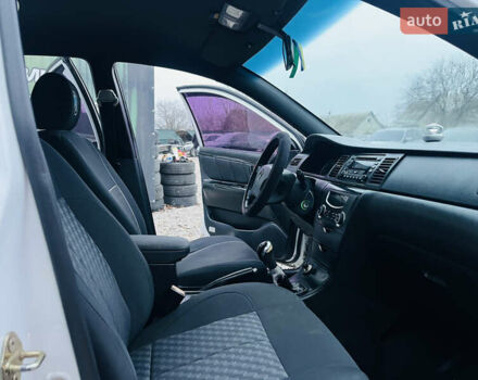 Білий Джилі СЛ, об'ємом двигуна 1.79 л та пробігом 184 тис. км за 3400 $, фото 18 на Automoto.ua