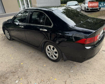 Черный Хонда Аккорд, объемом двигателя 2 л и пробегом 290 тыс. км за 7200 $, фото 1 на Automoto.ua
