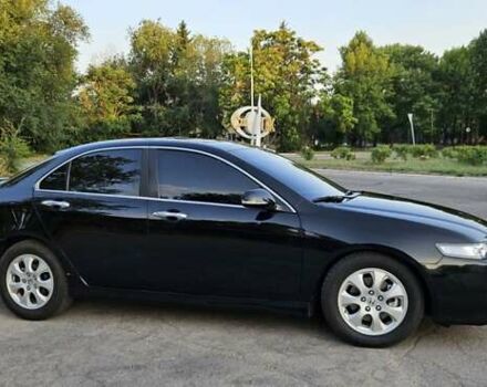Черный Хонда Аккорд, объемом двигателя 2.4 л и пробегом 173 тыс. км за 6700 $, фото 1 на Automoto.ua
