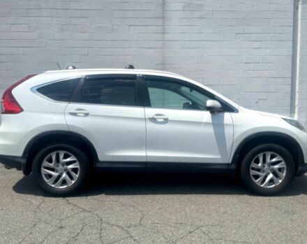 Белый Хонда СРВ, объемом двигателя 2.4 л и пробегом 77 тыс. км за 9900 $, фото 2 на Automoto.ua