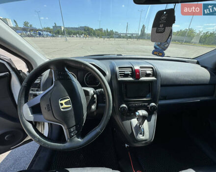Белый Хонда СРВ, объемом двигателя 2.35 л и пробегом 270 тыс. км за 11000 $, фото 3 на Automoto.ua