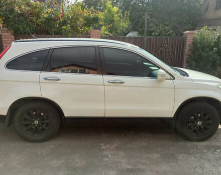 Белый Хонда СРВ, объемом двигателя 2.35 л и пробегом 190 тыс. км за 11800 $, фото 1 на Automoto.ua