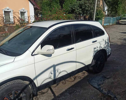 Белый Хонда СРВ, объемом двигателя 2.35 л и пробегом 190 тыс. км за 12500 $, фото 2 на Automoto.ua