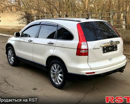 Белый Хонда СРВ, объемом двигателя 24 л и пробегом 153 тыс. км за 13700 $, фото 2 на Automoto.ua
