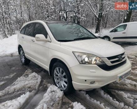 Белый Хонда СРВ, объемом двигателя 2 л и пробегом 204 тыс. км за 12300 $, фото 1 на Automoto.ua