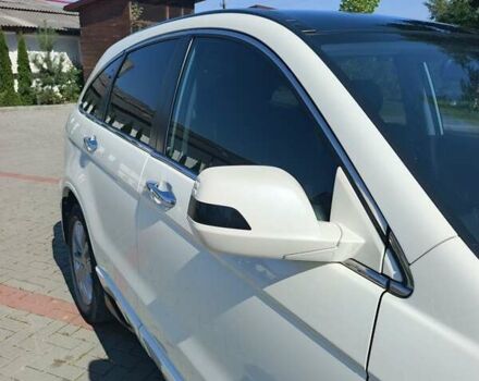 Білий Хонда СРВ, об'ємом двигуна 2.2 л та пробігом 241 тис. км за 13900 $, фото 22 на Automoto.ua