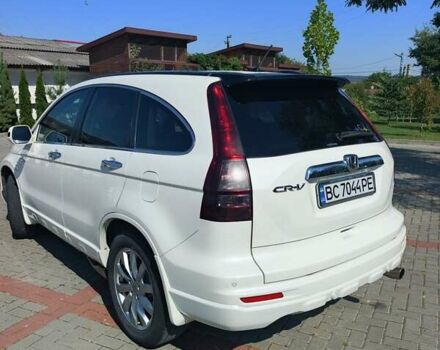 Білий Хонда СРВ, об'ємом двигуна 2.2 л та пробігом 241 тис. км за 13900 $, фото 1 на Automoto.ua