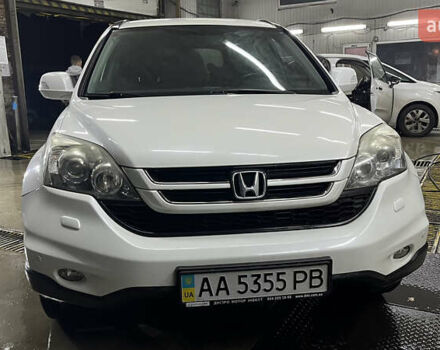 Белый Хонда СРВ, объемом двигателя 2 л и пробегом 128 тыс. км за 15000 $, фото 1 на Automoto.ua