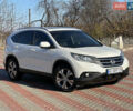 Белый Хонда СРВ, объемом двигателя 2.35 л и пробегом 200 тыс. км за 16800 $, фото 1 на Automoto.ua