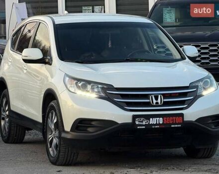 Белый Хонда СРВ, объемом двигателя 2.35 л и пробегом 175 тыс. км за 16500 $, фото 4 на Automoto.ua