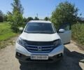 Белый Хонда СРВ, объемом двигателя 2.2 л и пробегом 246 тыс. км за 16400 $, фото 1 на Automoto.ua