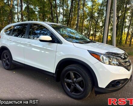 Белый Хонда СРВ, объемом двигателя 2.4 л и пробегом 150 тыс. км за 13980 $, фото 1 на Automoto.ua