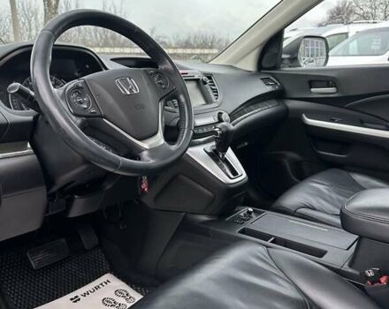 Белый Хонда СРВ, объемом двигателя 2.4 л и пробегом 185 тыс. км за 18000 $, фото 16 на Automoto.ua