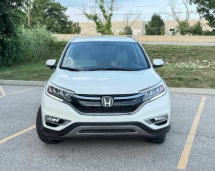 Белый Хонда СРВ, объемом двигателя 2.4 л и пробегом 72 тыс. км за 10000 $, фото 1 на Automoto.ua