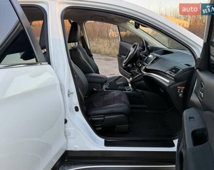 Белый Хонда СРВ, объемом двигателя 1.6 л и пробегом 176 тыс. км за 17890 $, фото 61 на Automoto.ua