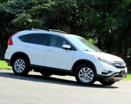 Белый Хонда СРВ, объемом двигателя 2.4 л и пробегом 70 тыс. км за 12300 $, фото 2 на Automoto.ua