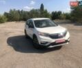 Белый Хонда СРВ, объемом двигателя 2.36 л и пробегом 160 тыс. км за 15799 $, фото 1 на Automoto.ua
