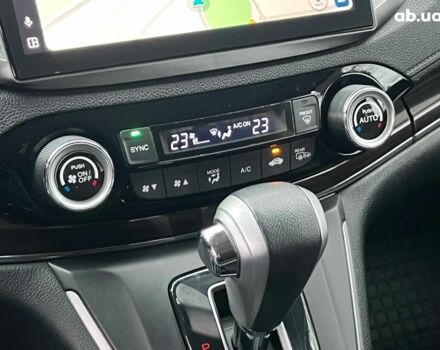 Білий Хонда СРВ, об'ємом двигуна 2.4 л та пробігом 155 тис. км за 26490 $, фото 25 на Automoto.ua