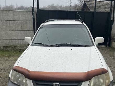 Белый Хонда СРВ, объемом двигателя 2 л и пробегом 330 тыс. км за 3900 $, фото 1 на Automoto.ua