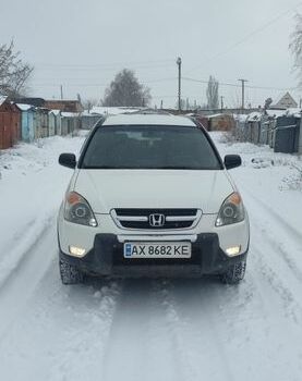 Белый Хонда СРВ, объемом двигателя 2 л и пробегом 256 тыс. км за 6400 $, фото 1 на Automoto.ua