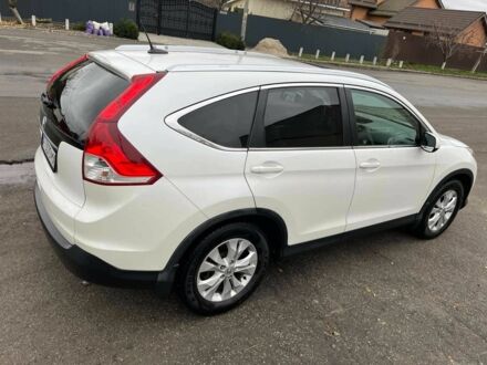 Белый Хонда СРВ, объемом двигателя 2.4 л и пробегом 124 тыс. км за 14777 $, фото 1 на Automoto.ua