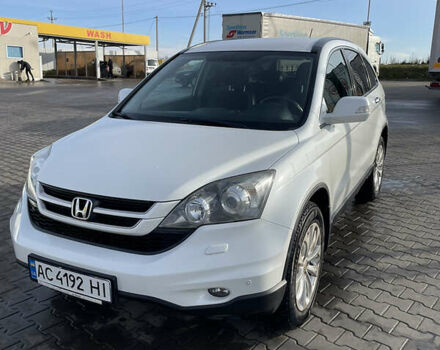 Белый Хонда СРВ, объемом двигателя 2.4 л и пробегом 144 тыс. км за 12400 $, фото 1 на Automoto.ua