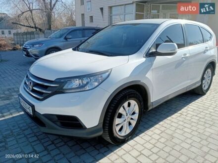 Белый Хонда СРВ, объемом двигателя 2 л и пробегом 255 тыс. км за 13000 $, фото 1 на Automoto.ua