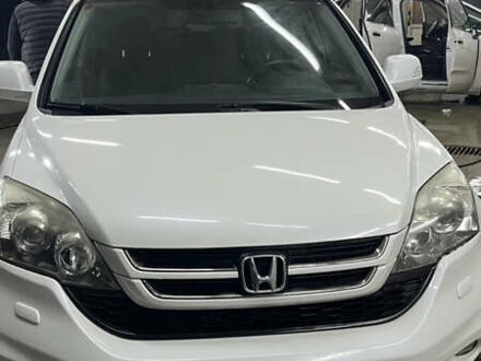 Белый Хонда СРВ, объемом двигателя 2 л и пробегом 128 тыс. км за 15000 $, фото 1 на Automoto.ua