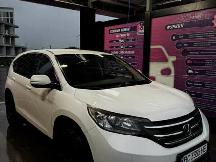 Белый Хонда СРВ, объемом двигателя 2.2 л и пробегом 208 тыс. км за 17200 $, фото 1 на Automoto.ua