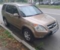 Бежевый Хонда СРВ, объемом двигателя 2 л и пробегом 255 тыс. км за 7200 $, фото 1 на Automoto.ua